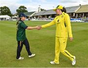 28 July 2023; Team captains Laura Delany of Ireland and Tahlia McGrath of Australia shake hands after match three of the Certa Women’s One Day International Challenge series between Ireland and Australia at Castle Avenue Cricket Ground in Dublin. Photo by Seb Daly/Sportsfile