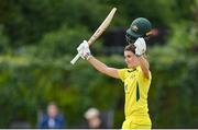 28 July 2023; Annabel Sutherland of Australia celebrates after bringing up her century of runs during match three of the Certa Women’s One Day International Challenge series between Ireland and Australia at Castle Avenue Cricket Ground in Dublin. Photo by Seb Daly/Sportsfile