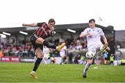 28 July 2023; Dylan Connolly of Bohemians shoots under pressure from Jesse Dempsey of UCD during the SSE Airtricity Men's Premier Division match between Bohemians and UCD at Dalymount Park in Dublin. Photo by Ramsey Cardy/Sportsfile