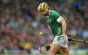 23 July 2023; Dan Morrissey of Limerick handpasses the sliotar during the GAA Hurling All-Ireland Senior Championship final match between Kilkenny and Limerick at Croke Park in Dublin. Photo by Brendan Moran/Sportsfile