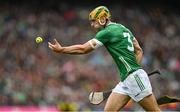 23 July 2023; Dan Morrissey of Limerick handpasses the sliotar during the GAA Hurling All-Ireland Senior Championship final match between Kilkenny and Limerick at Croke Park in Dublin. Photo by Brendan Moran/Sportsfile