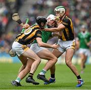 23 July 2023; Kyle Hayes of Limerick is tackled by Tom Phelan, left, and Paddy Deegan of Kilkenny during the GAA Hurling All-Ireland Senior Championship final match between Kilkenny and Limerick at Croke Park in Dublin. Photo by Brendan Moran/Sportsfile