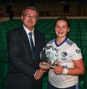 28 July 2023; Fainche Higgins of Cavan receives the Player of the Match award from Con Moynihan, President Connacht LGFA, following the LGFA All-Ireland U16 A Championship final replay match between Cork and Cavan at TUS Gaelic Grounds in Limerick. Photo by Michael P Ryan/Sportsfile