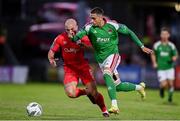 28 July 2023; Jaze Kabia of Cork City in action against Mark Coyle of Shelbourne during the SSE Airtricity Men's Premier Division match between Cork City and Shelbourne at Turner's Cross in Cork. Photo by Eóin Noonan/Sportsfile