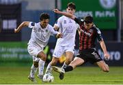 28 July 2023; Sean Brennan of UCD is tackled by James Clarke of Bohemians during the SSE Airtricity Men's Premier Division match between Bohemians and UCD at Dalymount Park in Dublin. Photo by Ramsey Cardy/Sportsfile