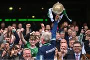 23 July 2023; Supporters celebrate as Limerick manager John Kiely lifts the Liam MacCarthy Cup after the GAA Hurling All-Ireland Senior Championship final match between Kilkenny and Limerick at Croke Park in Dublin. Photo by Ramsey Cardy/Sportsfile