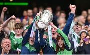 23 July 2023; Limerick manager John Kiely, with his daughters Ruth, left, and Aoife, lifts the Liam MacCarthy Cup after the GAA Hurling All-Ireland Senior Championship final match between Kilkenny and Limerick at Croke Park in Dublin. Photo by Ramsey Cardy/Sportsfile
