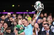 23 July 2023; Limerick goalkeeper Nickie Quaid, with his son Dáithí, lifts the Liam MacCarthy Cup after the GAA Hurling All-Ireland Senior Championship final match between Kilkenny and Limerick at Croke Park in Dublin. Photo by Ramsey Cardy/Sportsfile