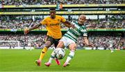 29 July 2023; Daizen Maeda of Celtic in action against Mario Lemina of Wolverhampton Wanderers during the pre-season friendly match between Celtic and Wolverhampton Wanderers at the Aviva Stadium in Dublin. Photo by Seb Daly/Sportsfile