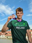 29 July 2023; Cian Crampton of Team Ireland with his discus Bronze medal on the Old Bridge in Maribor during day six of the 2023 Summer European Youth Olympic Festival at in Maribor, Slovenia. Photo by Tyler Miller/Sportsfile