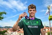 29 July 2023; Cian Crampton of Team Ireland with his discus Bronze medal on the Old Bridge in Maribor during day six of the 2023 Summer European Youth Olympic Festival at in Maribor, Slovenia. Photo by Tyler Miller/Sportsfile