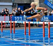 29 July 2023; Sarah Lavin of Emerald AC, Limerick, on her way to winning the women's  100m hurdles during day one of the 123.ie National Senior Outdoor Championships at Morton Stadium in Dublin. Photo by Stephen Marken/Sportsfile