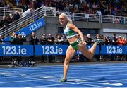 29 July 2023; Sarah Lavin of Emerald AC, Limerick, crosses the line to win women's 100m hurdles during day one of the 123.ie National Senior Outdoor Championships at Morton Stadium in Dublin. Photo by Sam Barnes/Sportsfile