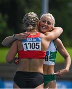 29 July 2023; Sarah Lavin of Emerald AC, Limerick, right, is congratulated by Lilly-Ann O'Hora of Dooneen AC, Limerick, after winning the women's 100m hurdles during day one of the 123.ie National Senior Outdoor Championships at Morton Stadium in Dublin. Photo by Sam Barnes/Sportsfile