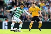 29 July 2023; Reo Hatate of Celtic in action against Joe Hodge of Wolverhampton Wanderers during the pre-season friendly match between Celtic and Wolverhampton Wanderers at the Aviva Stadium in Dublin. Photo by Seb Daly/Sportsfile