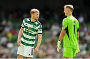 29 July 2023; Celtic goalkeeper Joe Hart, right, and teammate Liam Scales during the pre-season friendly match between Celtic and Wolverhampton Wanderers at the Aviva Stadium in Dublin. Photo by Seb Daly/Sportsfile