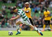 29 July 2023; Odin Thiago Holm of Celtic in action against Mario Lemina of Wolverhampton Wanderers during the pre-season friendly match between Celtic and Wolverhampton Wanderers at the Aviva Stadium in Dublin. Photo by Seb Daly/Sportsfile