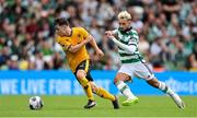 29 July 2023; Joe Hodge of Wolverhampton Wanderers in action against Sead Hakšabanovic of Celtic during the pre-season friendly match between Celtic and Wolverhampton Wanderers at the Aviva Stadium in Dublin. Photo by Seb Daly/Sportsfile