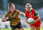 29 July 2023; Lisa Cafferky of Mayo in action against Eilís Lynch of Kerry during the TG4 LGFA All-Ireland Senior Championship semi-final match between Kerry and Mayo at Semple Stadium in Thurles, Tipperary. Photo by Piaras Ó Mídheach/Sportsfile