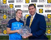 29 July 2023; Lauren Magee of Dublin receives the Player of the Match award from Mícheál Naughton, LGFA President, after the TG4 LGFA All-Ireland Senior Championship semi-final match between Dublin and Cork at Semple Stadium in Thurles, Tipperary. Photo by Piaras Ó Mídheach/Sportsfile