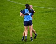 29 July 2023; Dublin players Chloe Darby, behind, and Eilish O'Dowd celebrate after their side's victory in the TG4 LGFA All-Ireland Senior Championship semi-final match between Dublin and Cork at Semple Stadium in Thurles, Tipperary. Photo by Piaras Ó Mídheach/Sportsfile