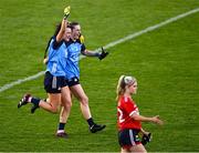 29 July 2023; Dublin players Leah Caffrey, left, and Martha Byrne celebrate after their side's victory in the TG4 LGFA All-Ireland Senior Championship semi-final match between Dublin and Cork at Semple Stadium in Thurles, Tipperary. Photo by Piaras Ó Mídheach/Sportsfile