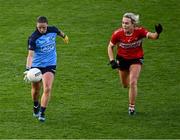 29 July 2023; Orlagh Nolan of Dublin in action against Katie Quirke of Cork during the TG4 LGFA All-Ireland Senior Championship semi-final match between Dublin and Cork at Semple Stadium in Thurles, Tipperary. Photo by Piaras Ó Mídheach/Sportsfile