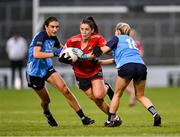 29 July 2023; Ciara O'Sullivan of Cork in action against Eilish O'Dowd, left, and Caoimhe O'Connor of Dublin during the TG4 LGFA All-Ireland Senior Championship semi-final match between Dublin and Cork at Semple Stadium in Thurles, Tipperary. Photo by Piaras Ó Mídheach/Sportsfile