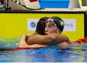 30 July 2023; Daniel Wiffen of Ireland, right, is seen with Ahmed Hafnaoui of Tunisa after the Men’s 1500m Freestyle final during day seventeen of the 2023 World Aquatics Championships at Marine Messe Fukuoka Hall A in Fukuoka, Japan. Photo by Ian MacNicol/Sportsfile