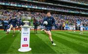 30 July 2023; Colm Basquel of Dublin runs past the Sam Maguire cup before the GAA Football All-Ireland Senior Championship final match between Dublin and Kerry at Croke Park in Dublin. Photo by David Fitzgerald/Sportsfile