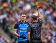 30 July 2023; Lee Gannon of Dublin is shown the yellow card by referee David Gough during the GAA Football All-Ireland Senior Championship final match between Dublin and Kerry at Croke Park in Dublin. Photo by Piaras Ó Mídheach/Sportsfile