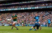 30 July 2023; Paul Geaney of Kerry evades the tackle of Dublin goalkeeper Stephen Cluxton on his way to scoring his side's first goal during the GAA Football All-Ireland Senior Championship final match between Dublin and Kerry at Croke Park in Dublin. Photo by Ramsey Cardy/Sportsfile