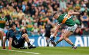 30 July 2023; Paul Geaney of Kerry takes a solo to dummy Dublin goalkeeper Stephen Cluxton during the GAA Football All-Ireland Senior Championship final match between Dublin and Kerry at Croke Park in Dublin. Photo by Brendan Moran/Sportsfile