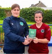 30 July 2023; Abby Kavanagh of Galway District League is presented with the player of the match award by FAI development officer Tracy Gleeso during the FAI Women's U19 Inter-League Cup match between North Tipperary Schoolchildrens Football League and Galway District League at Jackman Park in Limerick. Photo by Michael P Ryan/Sportsfile