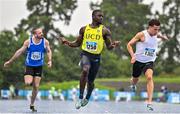 30 July 2023; Israel Olatunde of UCD AC, Dublin, centre, celebrates winning his men's 100m semi-final during day two of the 123.ie National Senior Outdoor Championships at Morton Stadium in Dublin. Photo by Sam Barnes/Sportsfile