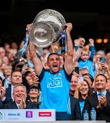 30 July 2023; Dublin captain James McCarthy lifts the Sam Maguire Cup after his side's victory in the GAA Football All-Ireland Senior Championship final match between Dublin and Kerry at Croke Park in Dublin. Photo by Ramsey Cardy/Sportsfile