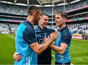 30 July 2023; Dublin players from left, James McCarthy, Stephen Cluxton and Michael Fitzsimons celebrate after the GAA Football All-Ireland Senior Championship final match between Dublin and Kerry at Croke Park in Dublin. Photo by Brendan Moran/Sportsfile