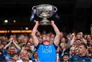 30 July 2023; Brian Fenton of Dublin lifts the Sam Maguire cup after the GAA Football All-Ireland Senior Championship final match between Dublin and Kerry at Croke Park in Dublin. Photo by Ramsey Cardy/Sportsfile