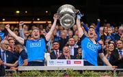 30 July 2023; Paddy Small, left, and John Small of Dublin lift the Sam Maguire cup after the GAA Football All-Ireland Senior Championship final match between Dublin and Kerry at Croke Park in Dublin. Photo by Ramsey Cardy/Sportsfile