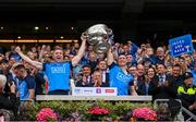 30 July 2023; Paddy Small, left, and John Small of Dublin lift the Sam Maguire cup after the GAA Football All-Ireland Senior Championship final match between Dublin and Kerry at Croke Park in Dublin. Photo by Ramsey Cardy/Sportsfile