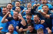30 July 2023; Dublin players, including Brian Fenton, Evan Comerford and Ryan Basquel celebrate after the GAA Football All-Ireland Senior Championship final match between Dublin and Kerry at Croke Park in Dublin. Photo by Ramsey Cardy/Sportsfile