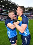 30 July 2023; Dublin players Paddy Small, left, and Dean Rock celebrate after their side's victory in the GAA Football All-Ireland Senior Championship final match between Dublin and Kerry at Croke Park in Dublin. Photo by Seb Daly/Sportsfile