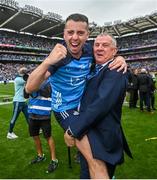 30 July 2023; Retiring Dublin GAA Chief Executive John Costello celebrates with his son Cormac Costello after the GAA Football All-Ireland Senior Championship final match between Dublin and Kerry at Croke Park in Dublin. Photo by David Fitzgerald/Sportsfile