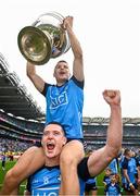 30 July 2023; Eoin Murchan, with the Sam Maguire cup, is held aloft by Brian Fenton of Dublin after the GAA Football All-Ireland Senior Championship final match between Dublin and Kerry at Croke Park in Dublin. Photo by Ramsey Cardy/Sportsfile