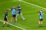 30 July 2023; Eoin Murchan of Dublin takes a photo of team-mates Stephen Cluxton, left, and James McCarthy, after the GAA Football All-Ireland Senior Championship final match between Dublin and Kerry at Croke Park in Dublin. Photo by Daire Brennan/Sportsfile