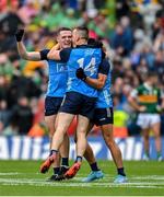 30 July 2023; Dublin players, from left, Brian Fenton, Con O'Callaghan and Niall Scully celebrate victory at the final whistle of the GAA Football All-Ireland Senior Championship final match between Dublin and Kerry at Croke Park in Dublin. Photo by Brendan Moran/Sportsfile