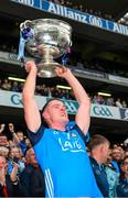 30 July 2023; Brian Fenton of Dublin lifts the Sam Maguire Cup after the GAA Football All-Ireland Senior Championship final match between Dublin and Kerry at Croke Park in Dublin. Photo by Ray McManus/Sportsfile