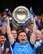30 July 2023; Ross McGarry of Dublin lifts the Sam Maguire Cup after his side's victory in the GAA Football All-Ireland Senior Championship final match between Dublin and Kerry at Croke Park in Dublin. Photo by Seb Daly/Sportsfile