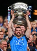 30 July 2023; Seán MacMahon of Dublin lifts the Sam Maguire Cup after his side's victory in the GAA Football All-Ireland Senior Championship final match between Dublin and Kerry at Croke Park in Dublin. Photo by Seb Daly/Sportsfile