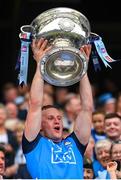 30 July 2023; Ciaran Kilkenny of Dublin lifts the Sam Maguire Cup after his side's victory in during the GAA Football All-Ireland Senior Championship final match between Dublin and Kerry at Croke Park in Dublin. Photo by Seb Daly/Sportsfile